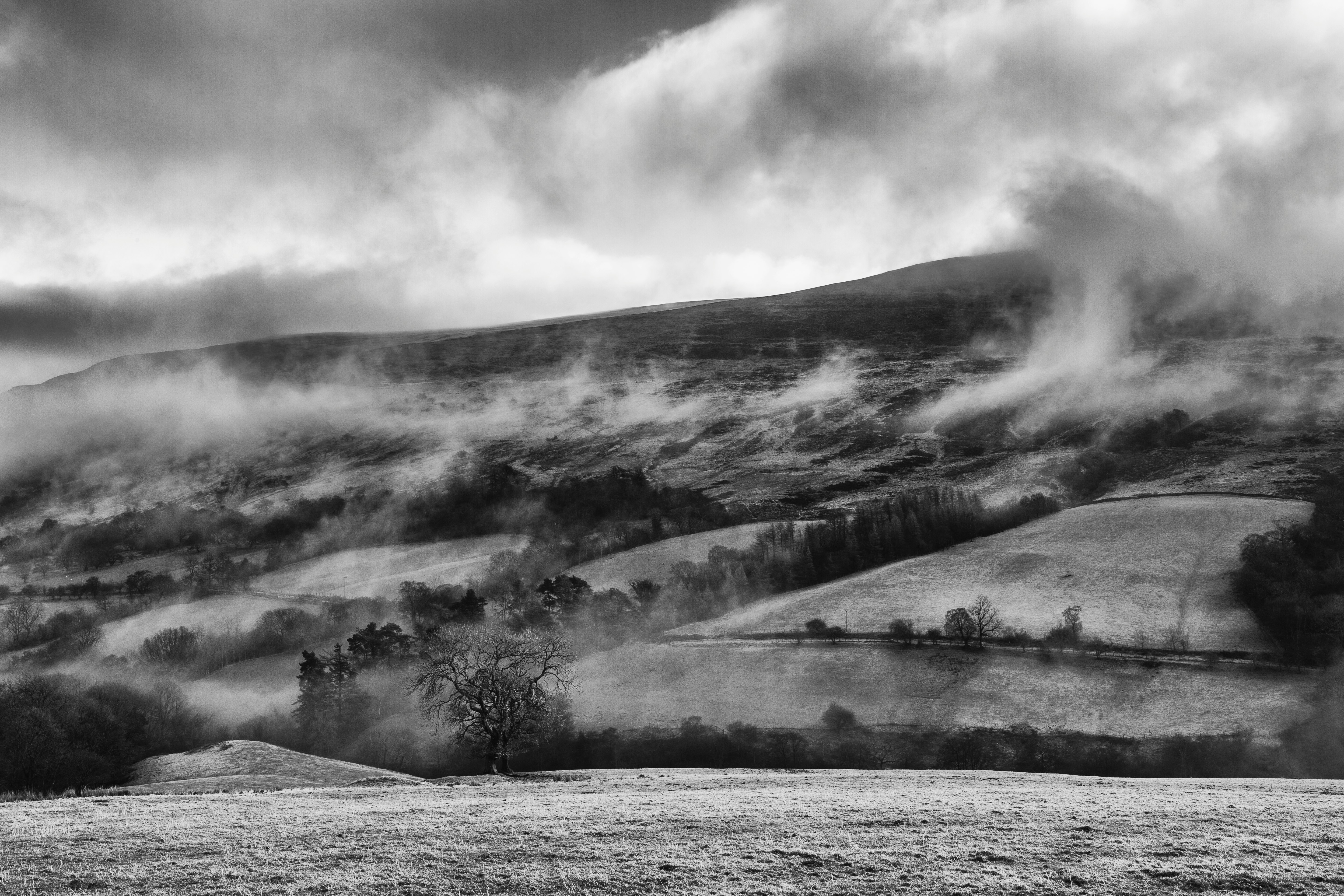 grayscale photo of mountains